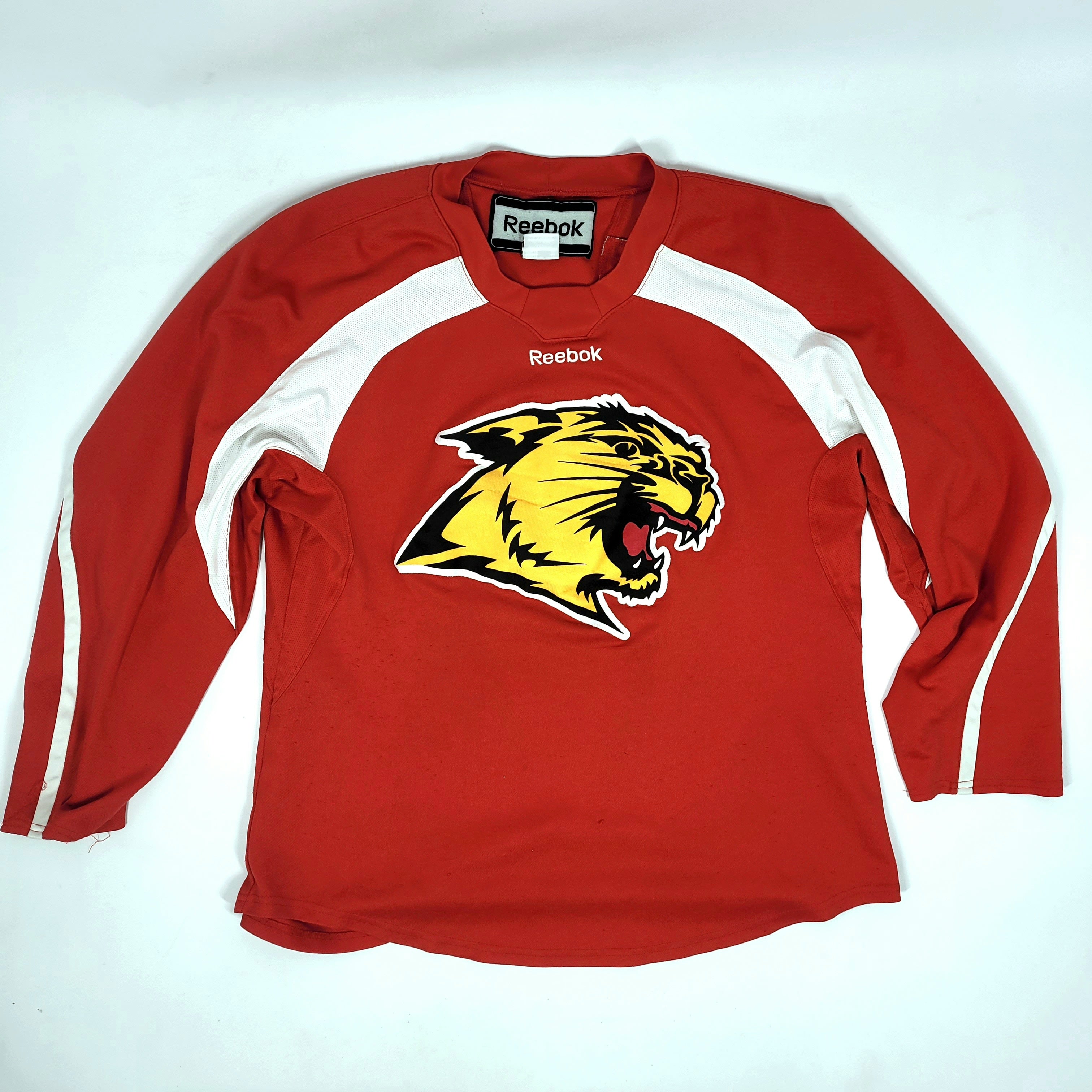 NCAA - Maillot d'entraînement Reebok d'occasion (plusieurs couleurs)